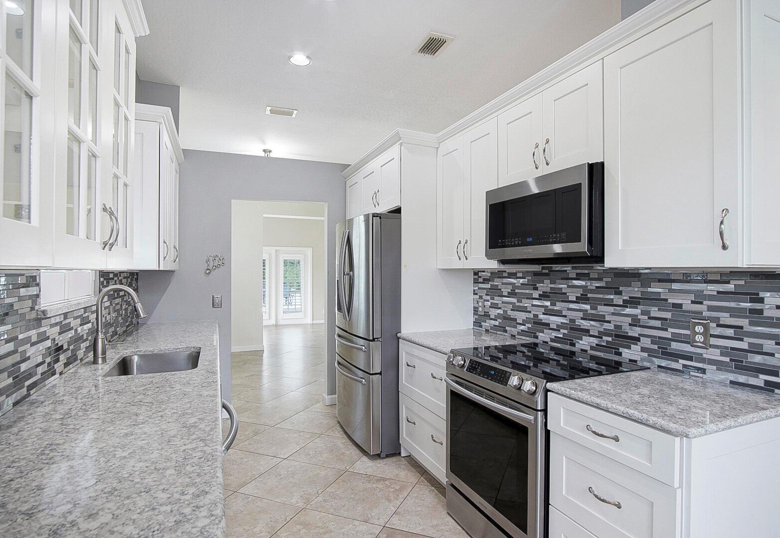 9401 Poinciana Court
