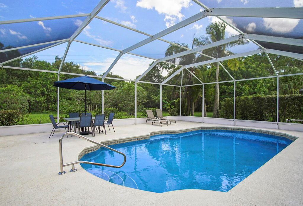 Photo of 9401 Poinciana Court, Fort Pierce, FL 34951 (MLS # R11119152)