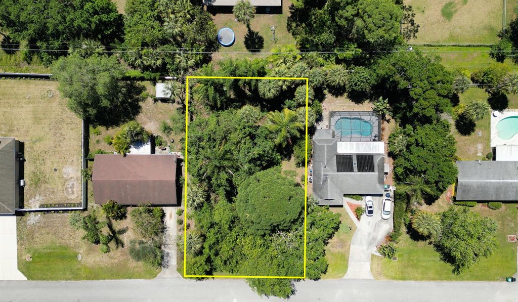 Photo of 7907 Santa Clara Boulevard, Fort Pierce, FL 34951 (MLS # R10975987)