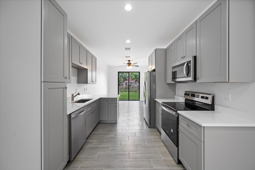 Photo of 1400 W 30th Street, Riviera Beach, FL 33404 (MLS # R11001487)