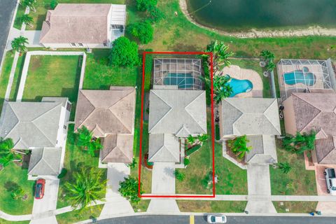 Photo of 6575 Spring Meadow Drive, Greenacres, FL 33413 (MLS # R11145874)