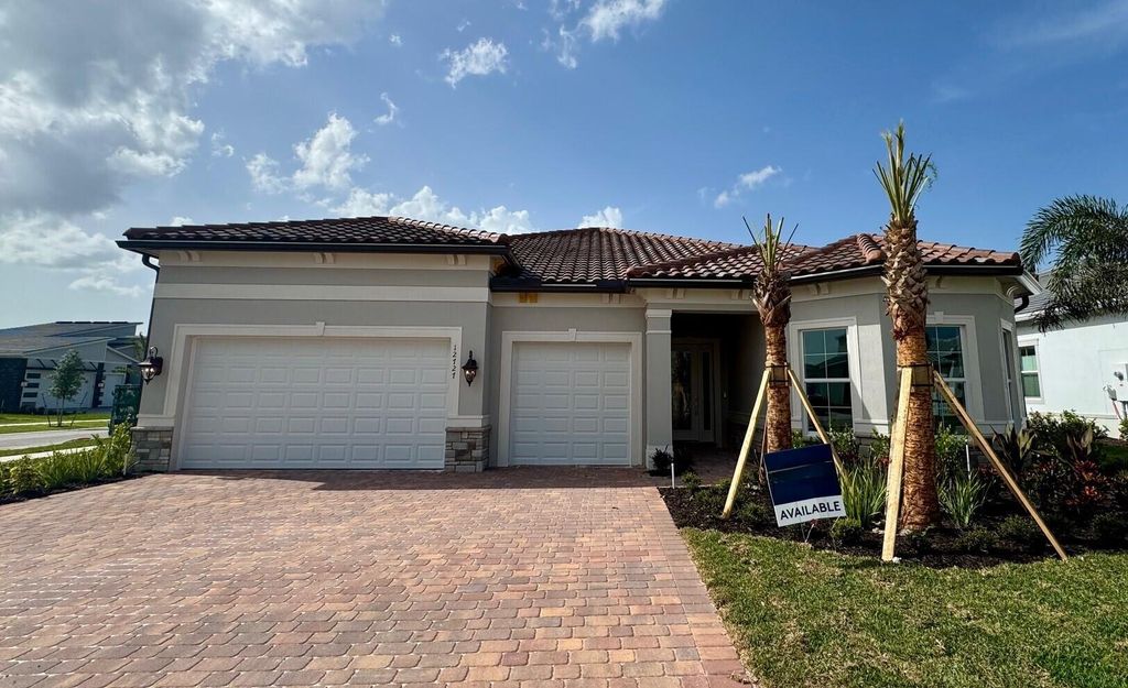 Photo of 12727 Nevins Lane #Renown 61, Palm Beach Gardens, FL 33412 (MLS # R11081184)
