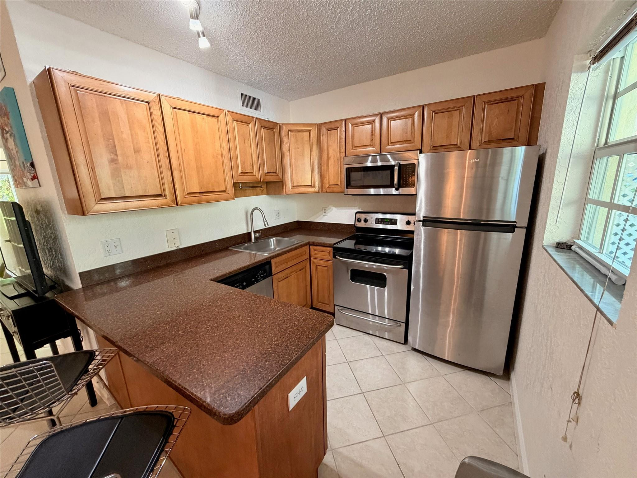 THE GROVE AT WILTON MANOR - Residential