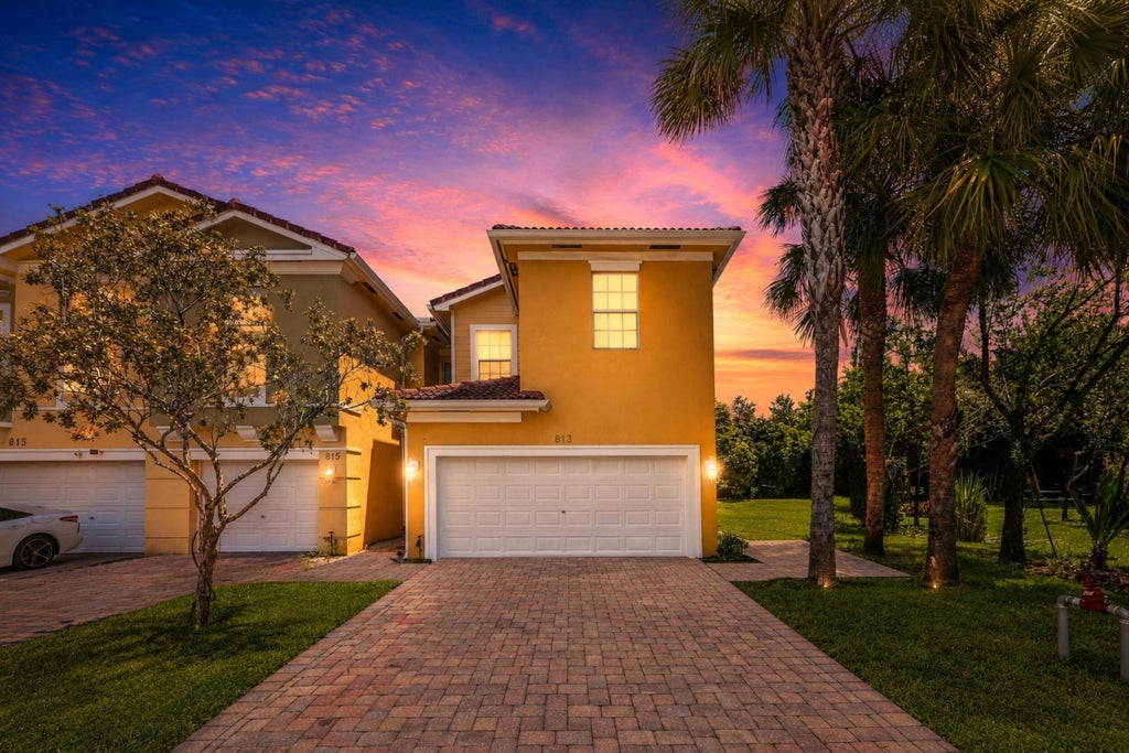 Photo of 813 Pipers Cay Drive, West Palm Beach, FL 33415 (MLS # B26070133)