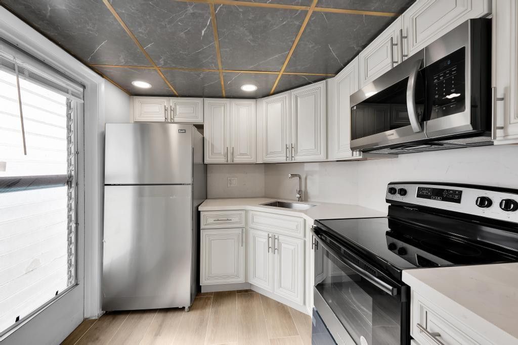 Photo of 1021 Crystal Lake Drive #202, Deerfield Beach, FL 33064 (MLS # F10496500)