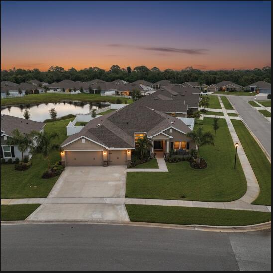 Better than NEW 2023 built.Premium 11,761 .27 acre Corner Lakefront Lot (35K upgrade from builder, no more left) 34K+ in after purchase upgrades including: Premium vinyl & metal (lake view side) Fence. Seamless gutters. Your OWN Irrigation well which saves thousands a year on your water bill & keeps your yard looking lush and beautiful! Meticulously maintained. 4 spacious bedrooms & 3 bathrooms including a cabana bath, den, covered patio & a massive 3 car garage. Crown Molding, lighting, backsplash, 3'' Blinds. HOA is a low $129 a year! Waterstone has lots of amenities Community pool, fitness room, playground, sidewalks, picnic area, volleyball, tennis and pickleball courts. County only property taxes! Room for a pool. Close to I-95 for easy commute N or S. Only 20 min to the beach.