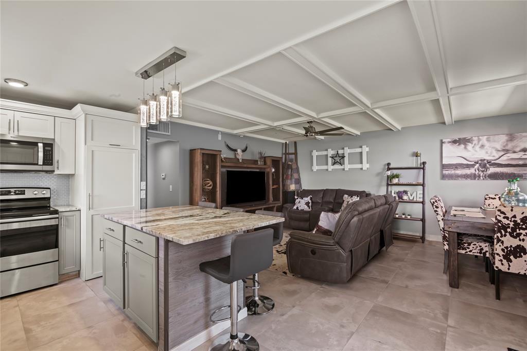 Gorgeous Remodeled First Floor Corner Condo in Kings Point, a desirable 55 Plus Guard Gated Community in Delray Beach. This modern Two Bedroom Two Bathroom unit has been completely updated with open concept chef's kitchen, granite countertops, cabinetry, stainless steel appliances, pantry & Island! Spacious Living & Dining Room perfect for entertaining guests. Tile throughout the unit. Renovated Bathrooms have walk-in showers. Master Bedroom has Walk-In Closet. Large Florida Room has plenty of space for storage. Kings Point community offers many amenities: clubhouse, community pools, two restaurants, a theater, tennis courts, and a transportation system. Great location close to Atlantic Avenue, major highways and Delray beaches.