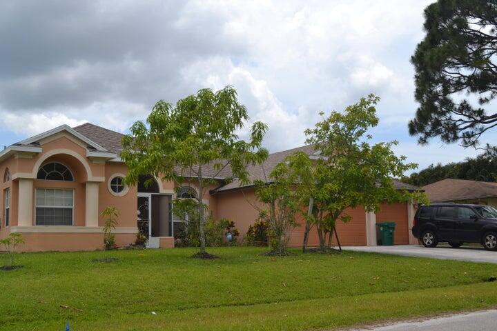 Fantastic 4 Bed, 3 Bath Home with 3-Car Garage and 2395 sqft of living space. Featuring an oversized ''L'' shaped screened patio with the perfect set up for a huge pool. Offers a perfect blend of spacious living and premium features designed for comfort, security, and entertaining. Other features from this popular Jacqueline model built by Mercedes Homes include volume ceiling, tile flooring throughout, separate Living & Family Rooms, Formal Dining, Breakfast Nook, a Chef's Kitchen with Center Cooking Island and pantry. A tri-split floor plan. The large Master Suite comes with Dual Closets, dual vanity, soaking tub, separate shower, sliders that leads to patio. New hurricane impact windows throughout. Working sprinkler system. W/H 2025, AC 2007, Roof 2007