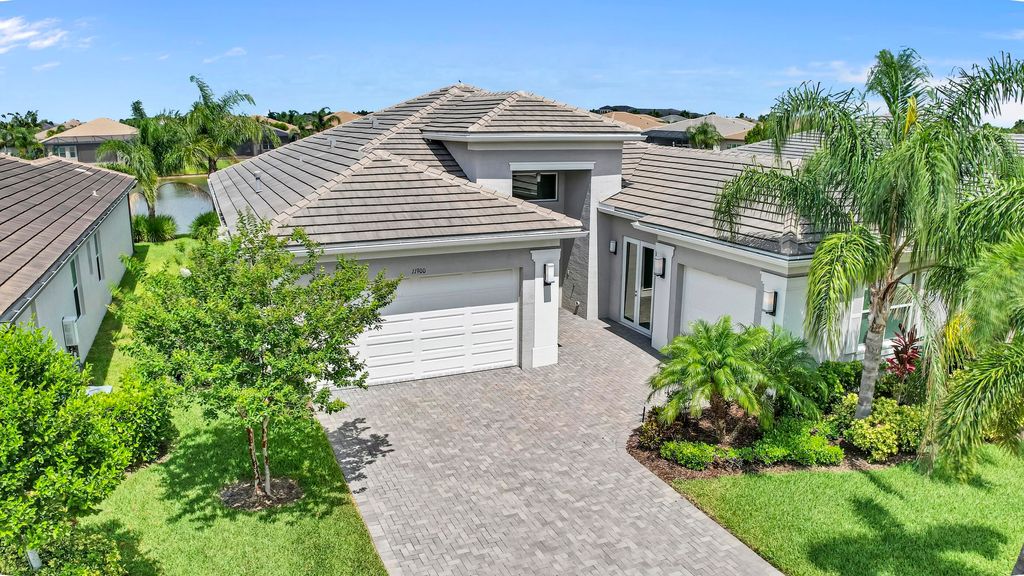 Photo of 11900 SW Marigold Lakes Drive, Port Saint Lucie, FL 34987 (MLS # R10997449)