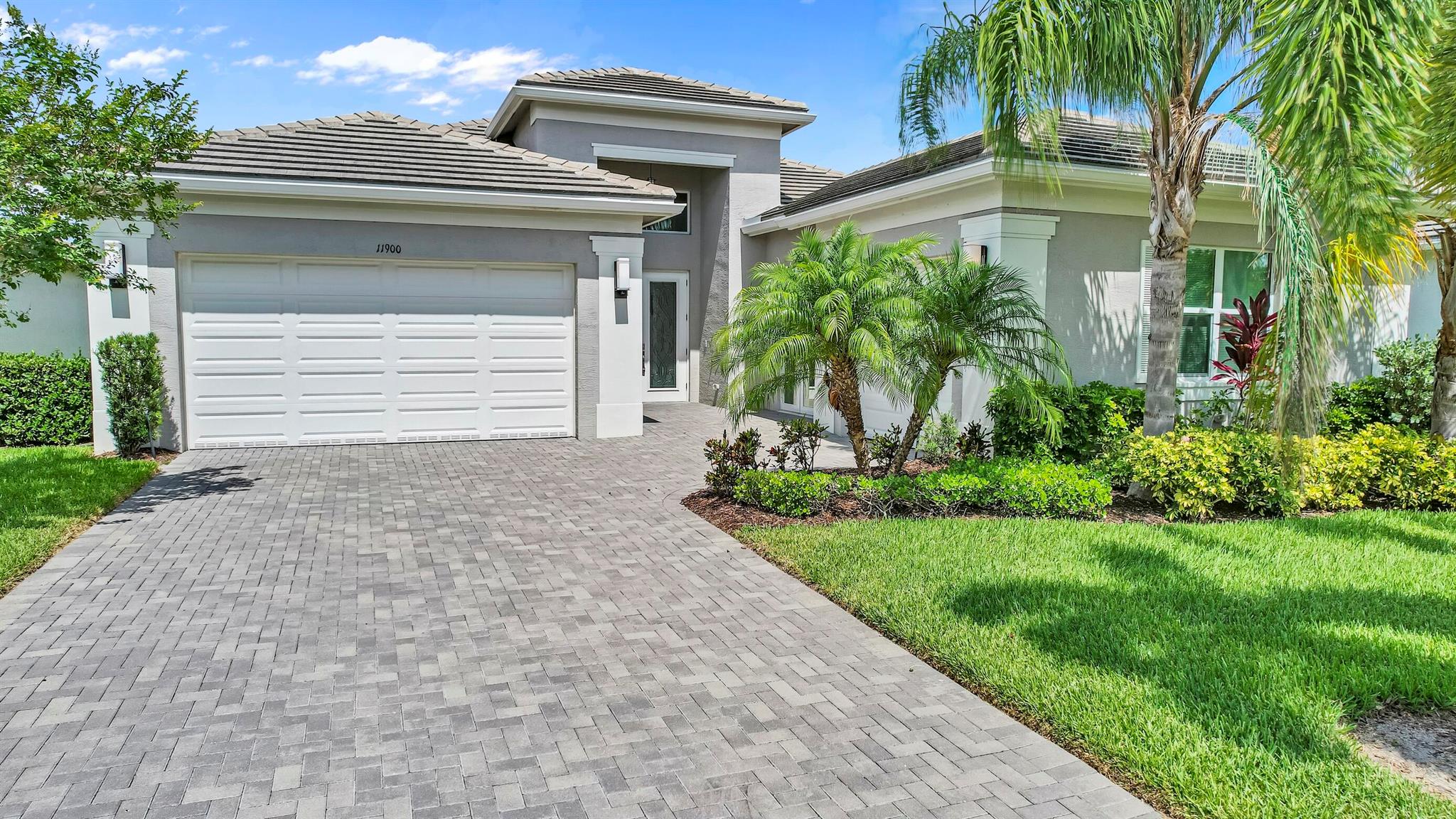 Beautiful $70k Lake View. Open floor plan. True chefs' kitchen has wall to wall cabinetry including lots of added custom pantry closets $10k upgrade! Center island, counter seating and an eat in kitchen overlooking the lake. Extra-large $10k laundry upgrade with lots of storage and counters, There are 2 on-suite bedrooms (and a powder room for guests) and huge bed/den, This unique model offers the possibility of mother-in-law suite w private entry, shared living/guest quarters by only adding one door! All one-level living. Everybody's dream having a 3 car garage! Better then new! Added perks $$$ SEE ADDENDUM FOR MORE enjoy elegant lighting and beautiful chandeliers and fans also the window coverings include shades/blinds thruout the home. Front doors $10k upgrade Fantastic amenities CONT.