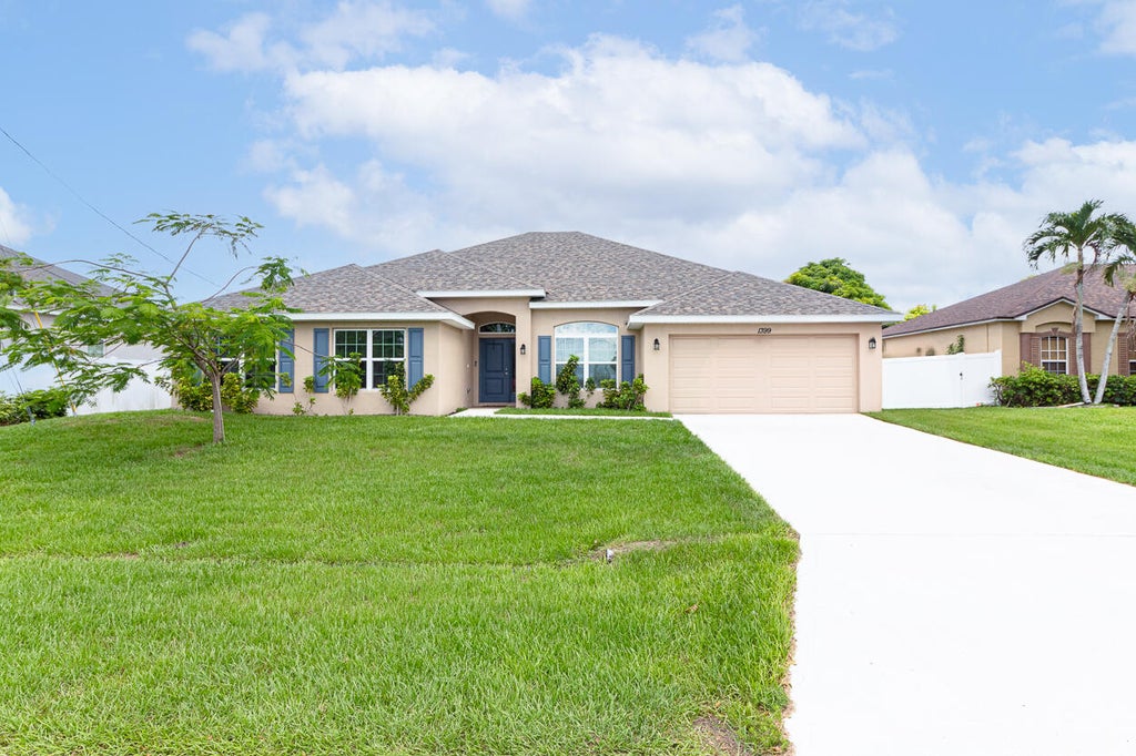 Photo of 1399 SW Edinburgh Drive, Port Saint Lucie, FL 34953 (MLS # B26048148)