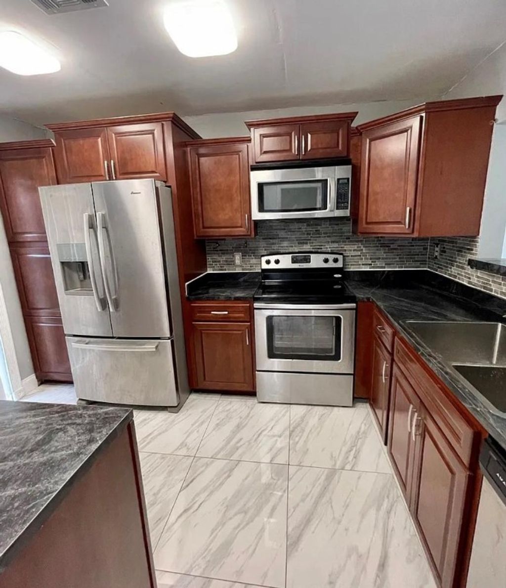 Photo of 9540 NW 65th Street #D8, Tamarac, FL 33321 (MLS # F10499242)