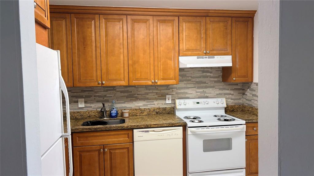 Photo of 5515 N Lakewood Circle #122, Margate, FL 33063 (MLS # F10550769)