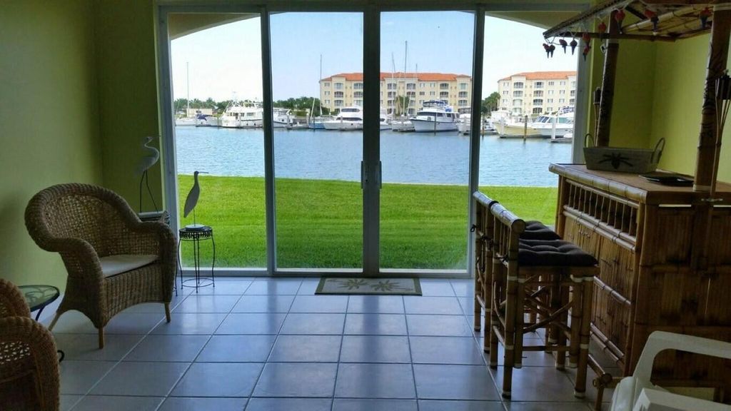 Photo of 13 Harbour Isle Drive W #101, Fort Pierce, FL 34949 (MLS # R10933774)