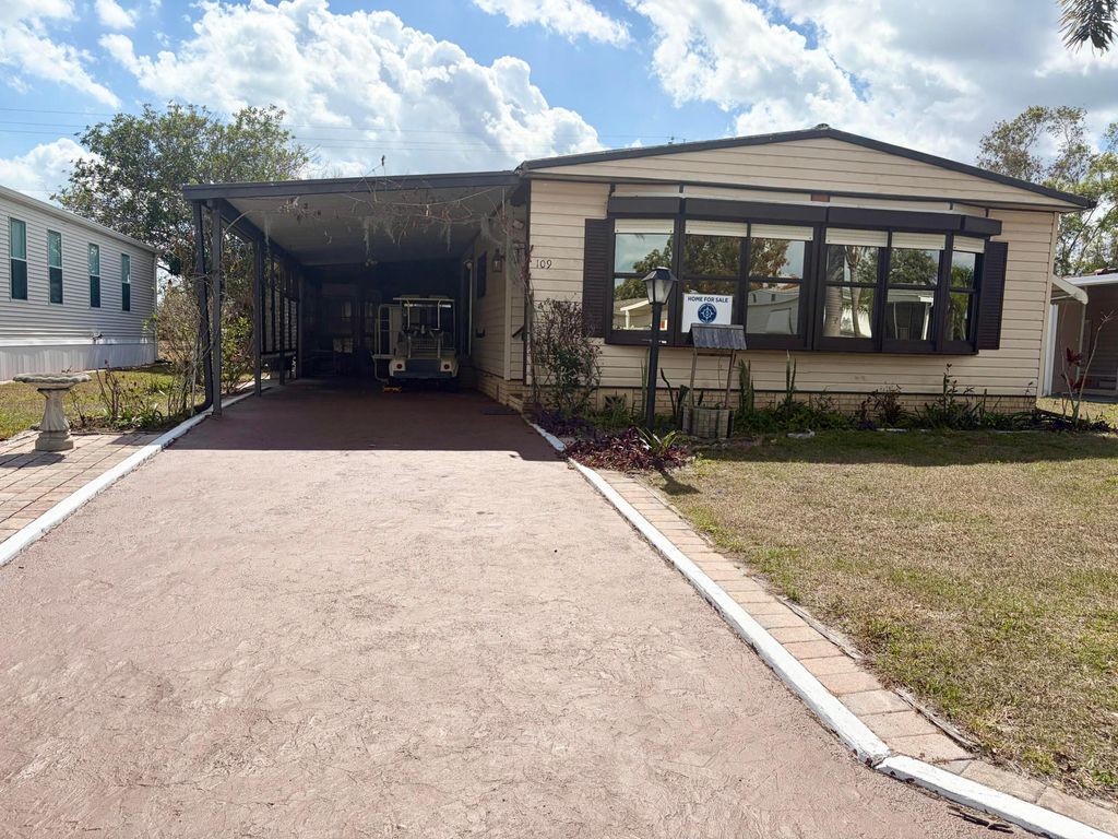 Photo of 109 East Caribbean, Port Saint Lucie, FL 34952 (MLS # R11144188)
