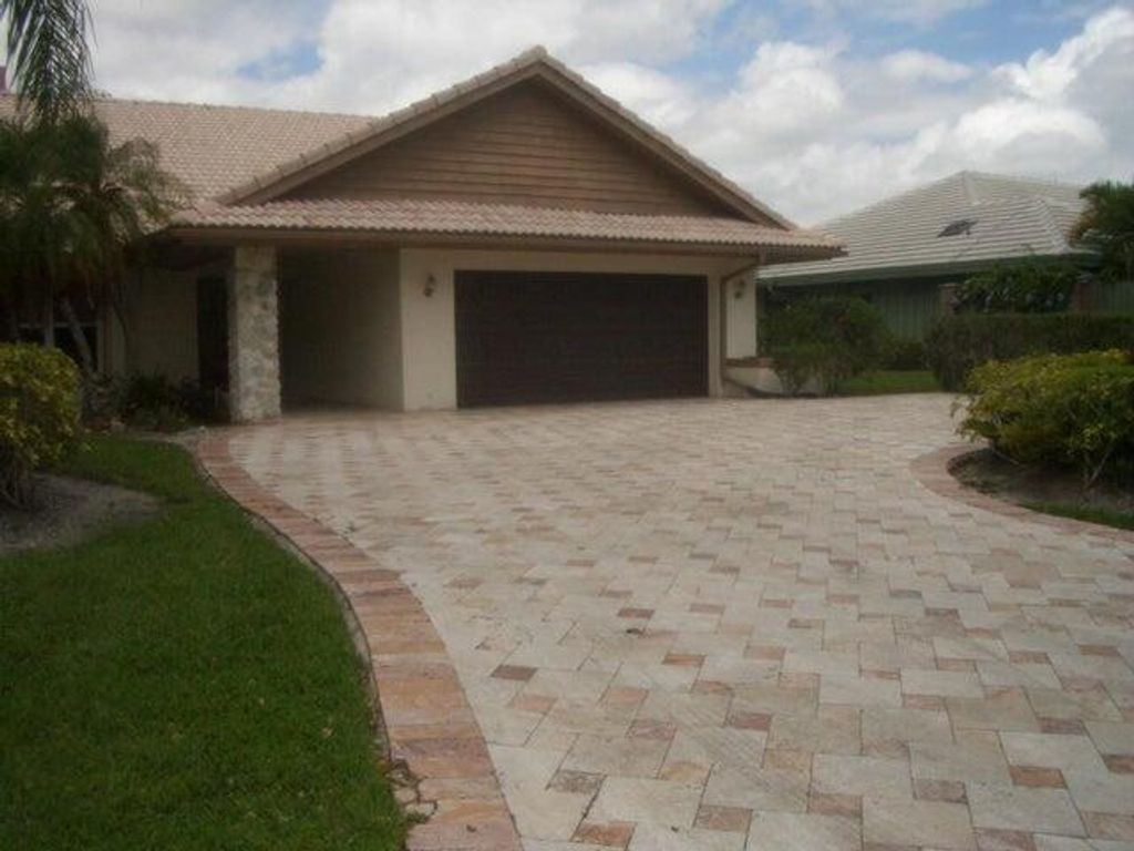 Photo of 24 Dunbar Road, Palm Beach Gardens, FL 33418 (MLS # R11098987)