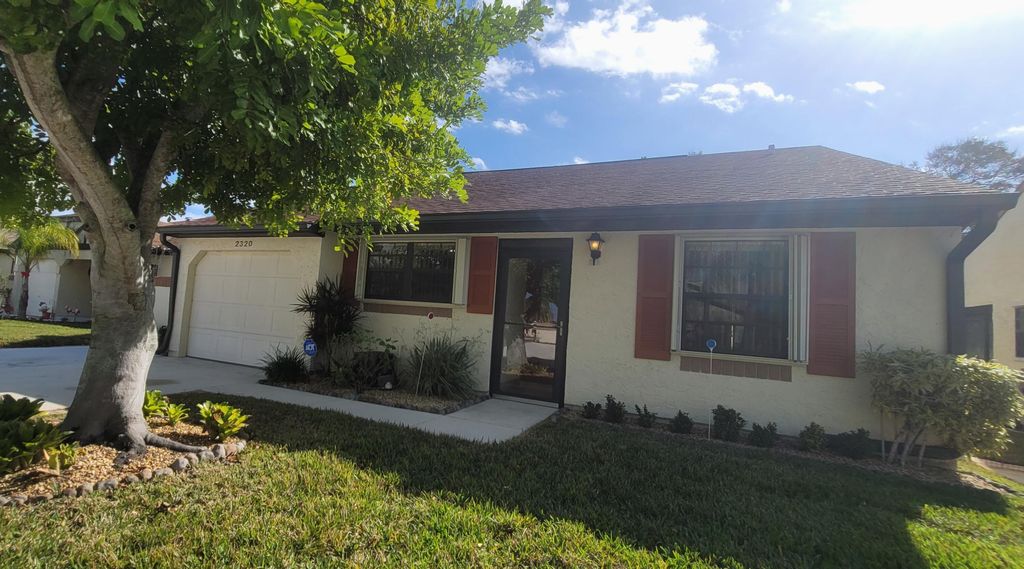 Photo of 2320 SE Breckenridge Circle, Port Saint Lucie, FL 34952 (MLS # R10947685)