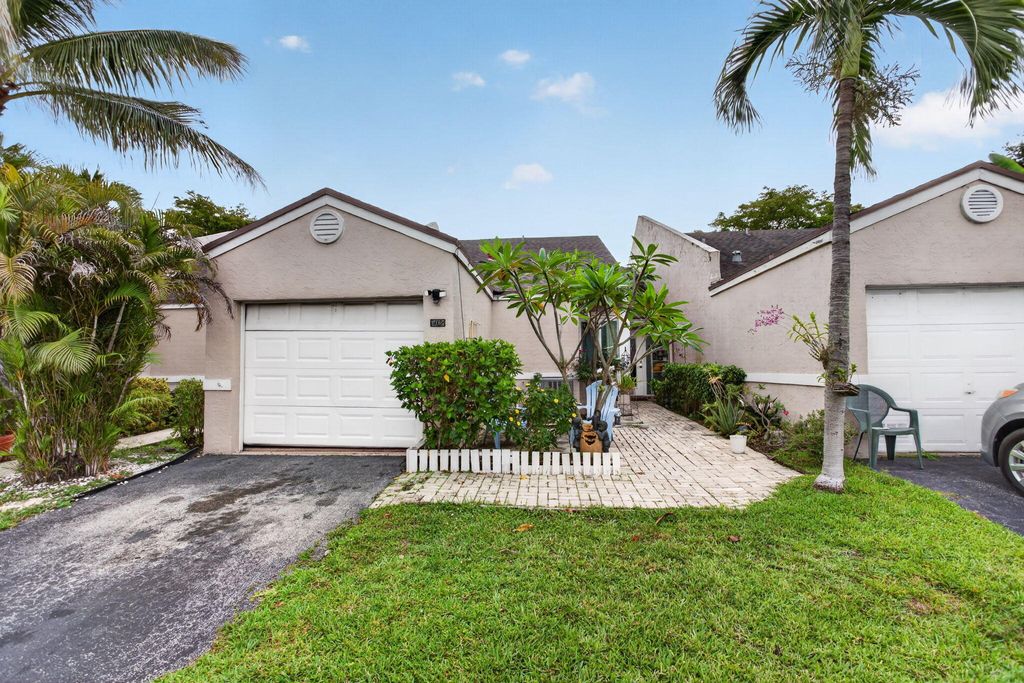 Photo of 5028 NW 11th Way, Deerfield Beach, FL 33064 (MLS # B26025048)