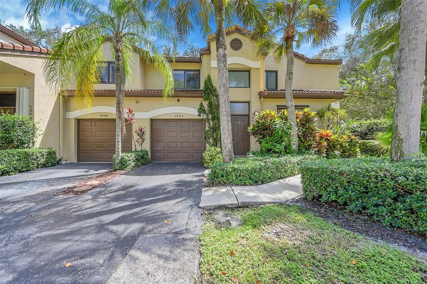 Spacious 3-bedroom, 2-bath coach home with a one-car garage located in the heart of Plantation. The entrance is on the first floor, with stairs leading up to the main living area. This home features impact windows, Plantation shutters, a large dining and living room, and an eat-in kitchen. The primary suite includes two walk-in closets with custom built-ins. Enjoy the convenience of an in-unit washer and dryer and relax on the second floor screened balcony. The Bridgewater Community has pool, park, basketball courts, tennis courts and a walking trail. Close to public and private schools, walking distance to religious institutions, near Publix, Winn-Dixie, 595, Sawgrass Expressway and I-75. Available now.