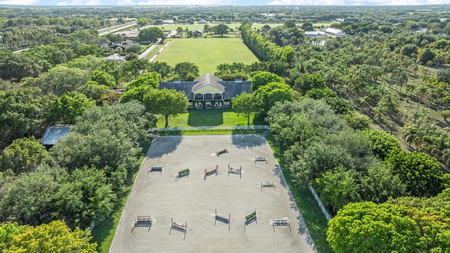 2027 Seasonal Price Breakdown: $11,500 per stall for season. Experience the ultimate equestrian property for both seasonal or annual rent. This exceptional farm offers a premier 22 stall barn, 4 horse walker and expansive 220x120 arena, designed for equestrians looking to train minutes from the Wellington International Showgrounds. The property also features a furnished riding lounge area for relaxation or entertaining as well as a private tack room/office and barn bathroom. The barn is fully equipped with fly spray systems and there is ample parking for cars behind the barn. Also available for rent (separately) is a 2 bedroom apartment above the barn as well as a one bedroom studio apartment on the lower level.