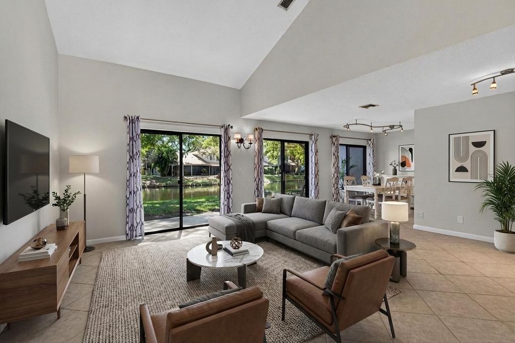 Photo of 660 Deer Creek Edgewater Drive, Deerfield Beach, FL 33442 (MLS # B26007183)