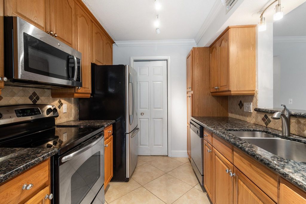 Photo of 815 W Boynton Beach Boulevard #16-105, Boynton Beach, FL 33426 (MLS # R11018990)