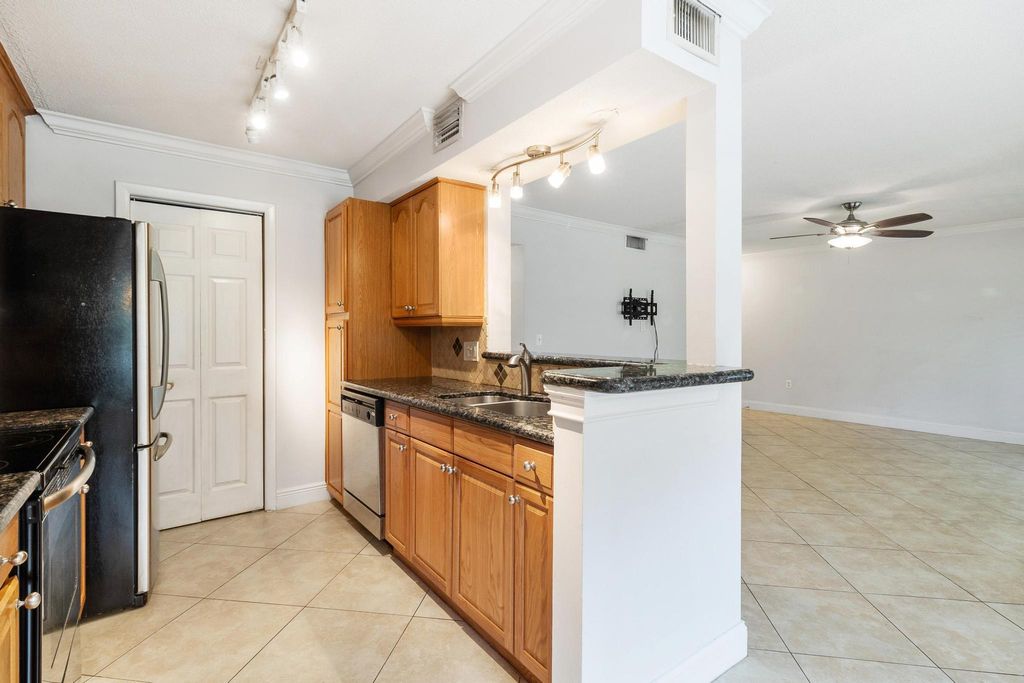 Photo of 815 W Boynton Beach Boulevard #16-105, Boynton Beach, FL 33426 (MLS # R11018990)