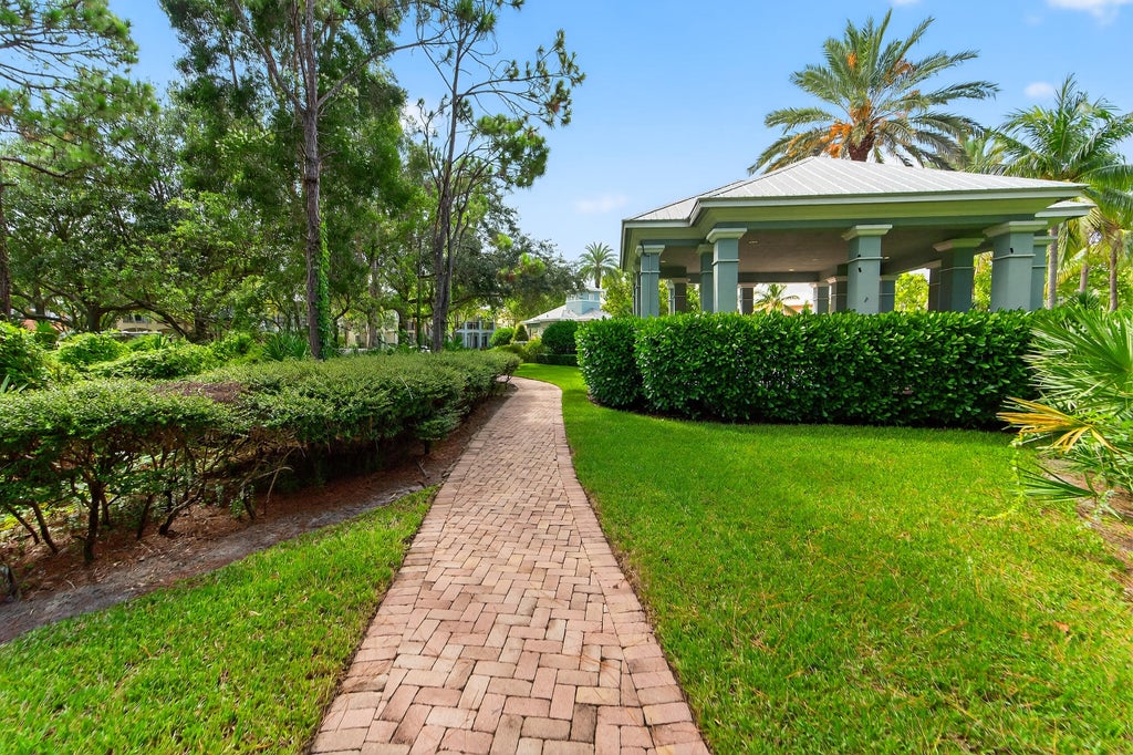 Photo of 297 E Bay Cedar Circle, Jupiter, FL 33458 (MLS # B26078934)