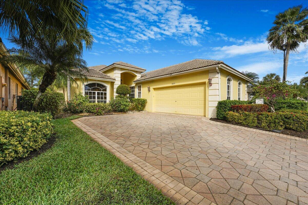 Luxury lakefront living awaits in this beautiful home in the prestigious Oakmont, Two spacious master suites featuring stunning views and vaulted ceilings that create an open and elegant atmosphere, Built-in shelves provide stylish and practical storage solutions throughout the oversized living, dining, and kitchen areas. Water and golf views from your huge screen patio. Experience resort-style amenities, including a fabulous clubhouse. No country club required!!!