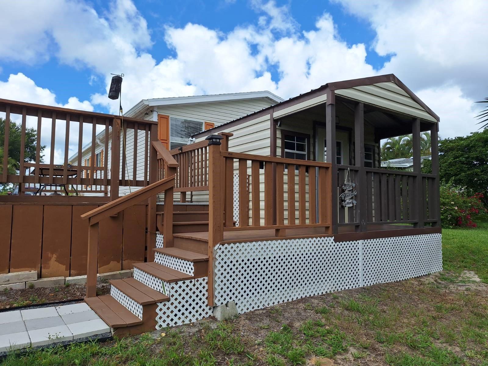 This is a really great buy! 3/2 for under $75K, Unheard of. This one is move in ready. Overside Workshop with power and an AC...#Artist? #Woodworkers? #tinkerers? High and Dry with no chance of flooding. Beach Cove has a clubhouse & pool and is set back in the woods.