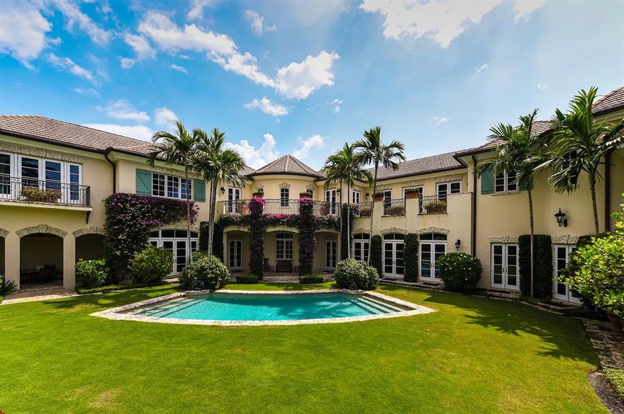 Sensationally located on one of the most desired Palm Beach estate area streets, this exceptional estate sits on over 1/2 an acre of lush, tropical landscaping designed by Mario Nievera. With 6 bedrooms/7 bathrooms/3 HB, it exudes elegance and easy indoor/outdoor living with peeks of the Intracoastal from the second level. Perfect for entertaining with ultra-high ceilings and well scaled rooms, you will be mesmerized by its thoughtful vignettes, outdoor loggias and stunning pool/patio areas. Its numerous amenities include: limestone flooring, hurricane impact windows/doors, one touch lighting system, 3 car garage with rear access road, generous off-street parking, and full house generator. Private beach access via gated easement. Excellent value with over 10,000 sf.