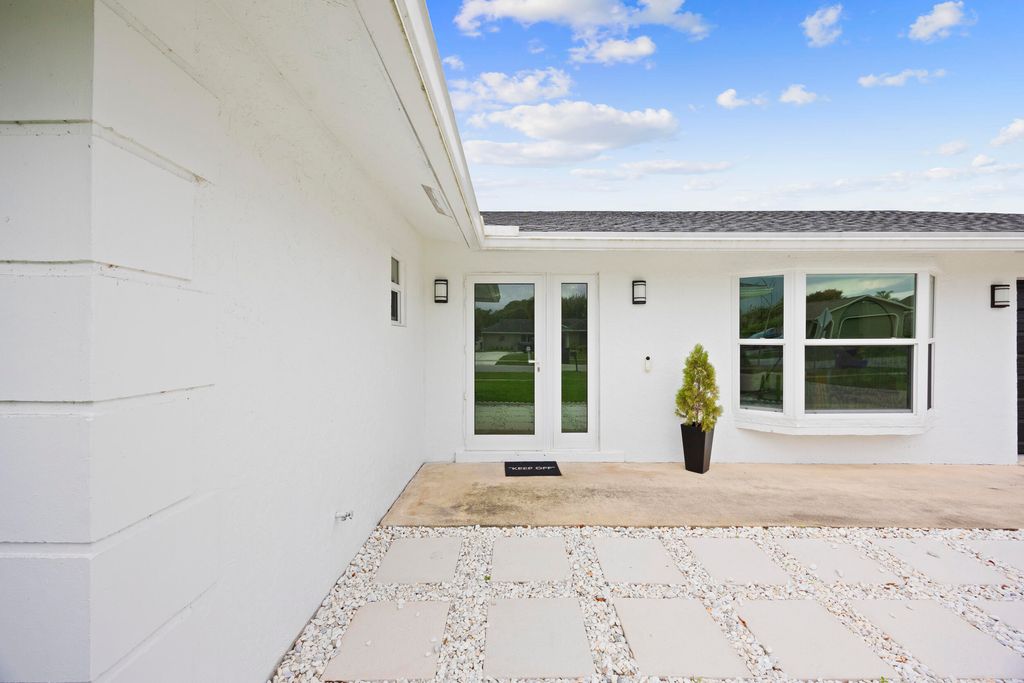 Photo of 11760 Inverness Circle, Wellington, FL 33414 (MLS # B26002567)