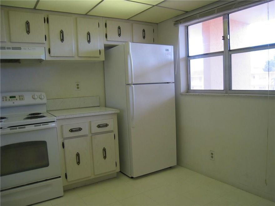 IMMACULATE AND SUNNY UNIT WITH FABULOUS GOLF COURSE, GARDEN AND WATER VIEWS.  NEWER A/C AND WATER HEATER.  ENCLOSED TILED PATIO FOR ALL WEATHER USE WITH CUSTOM BUILT CLOSET.  WALK TO SHOPPING.  ASSOC. STATES 55+.
