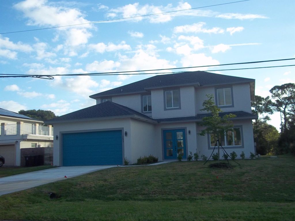 Photo of 1633 SW Davis Street, Port Saint Lucie, FL 34953 (MLS # R10947932)