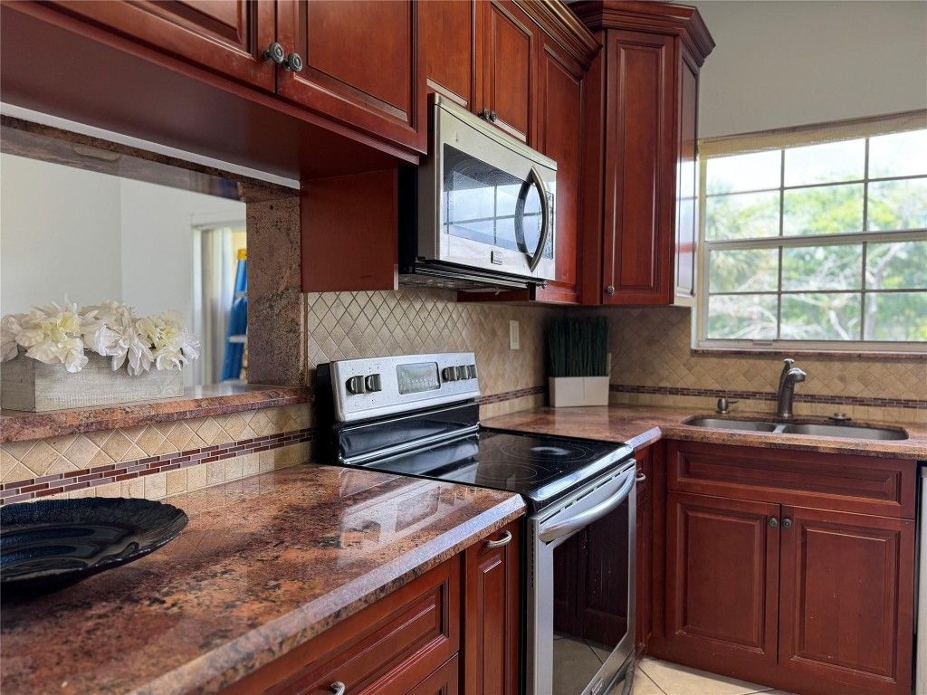 Photo of 800 Cypress Park Way #O, Pompano Beach, FL 33064 (MLS # F10511319)