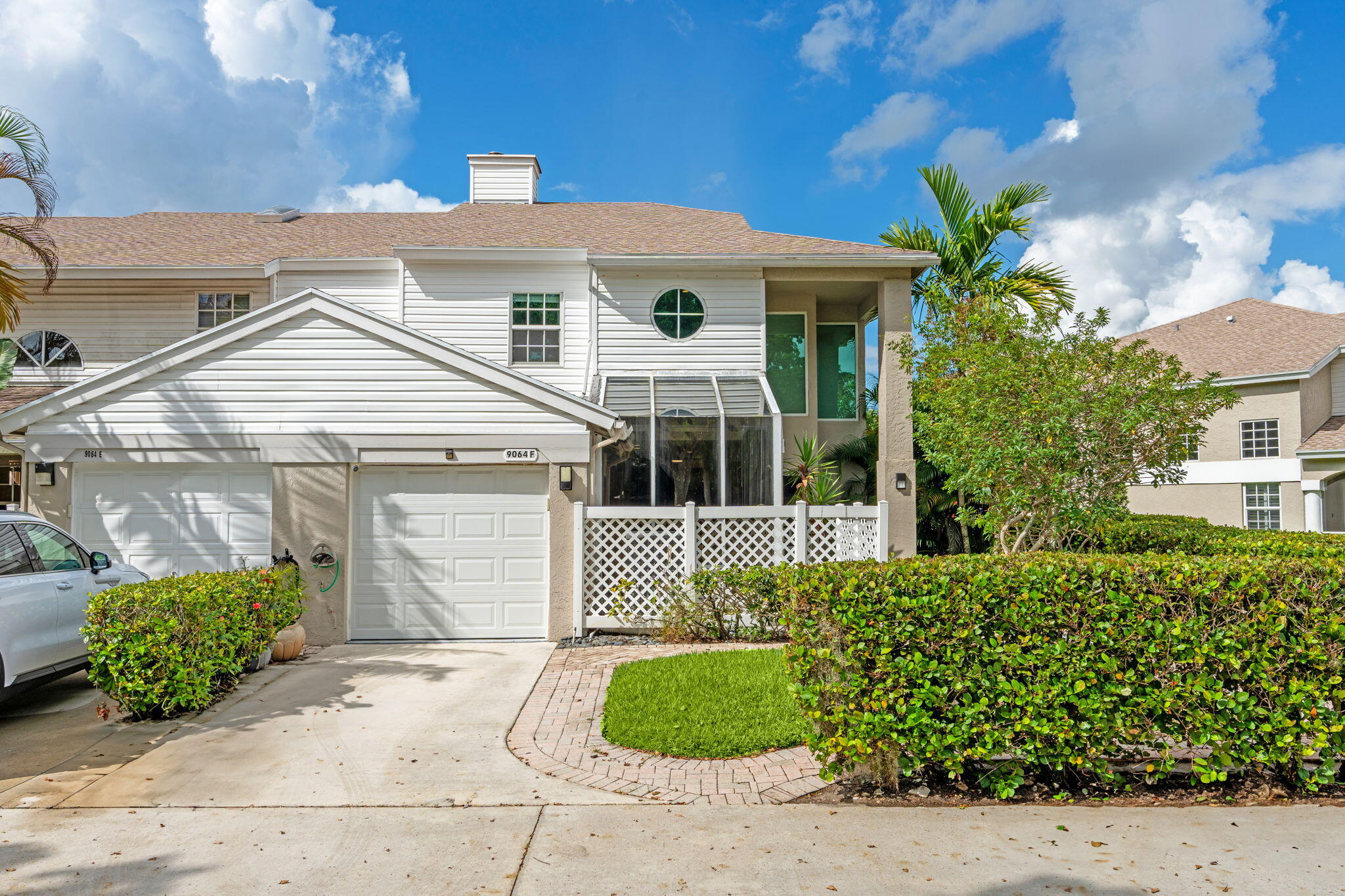 Rarely available corner‑unit townhouse in the highly desirable Boca Gardens community with lakefront views. This 3 bed, 21/2 bath home features soaring high ceilings in the main living area, a spacious kitchen equipped with stainless steel appliances (including an incredible newer fridge) and granite countertops, and a ground‑floor master bedroom. Upstairs, find two generously sized secondary bedrooms. The unit offers a screened‑in patio with southwest exposure, ideal for enjoying stunning sunset views. Not to mention IMPACT GLASS, NEW ROOF, NEWER WATER HEATER!! Boca Gardens community includes a gym, renovated clubhouse, three pools, tennis, and pickleball.