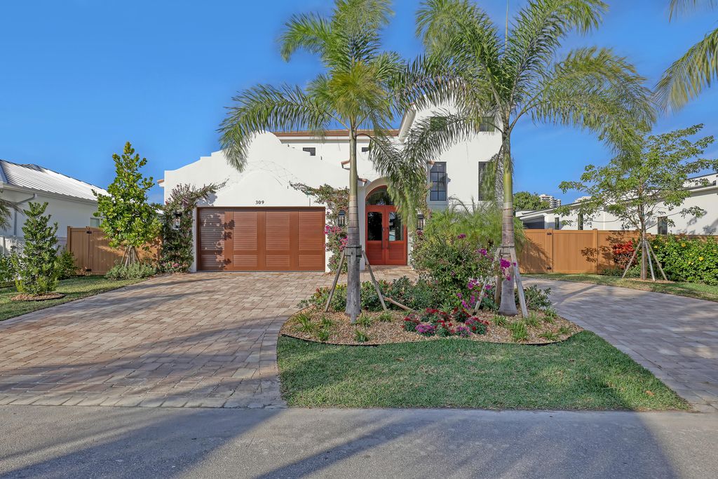 Photo of 309 Cascade Lane, Palm Beach Shores, FL 33404 (MLS # R11147817)