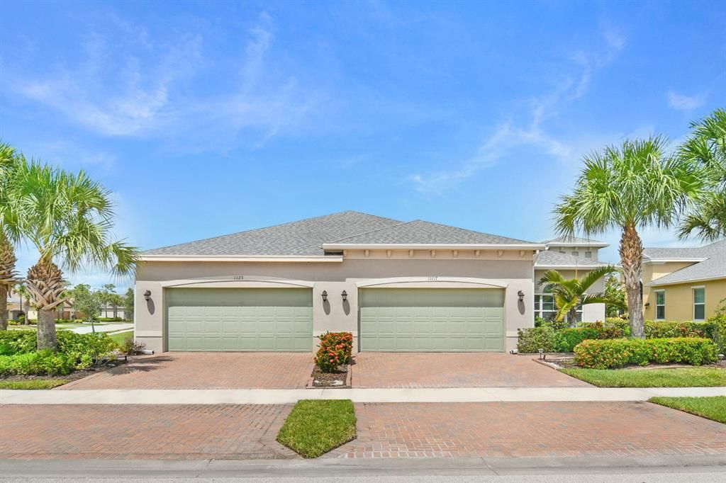Photo of 11123 SW Sunrise Lake Drive, Port Saint Lucie, FL 34987 (MLS # R11124514)