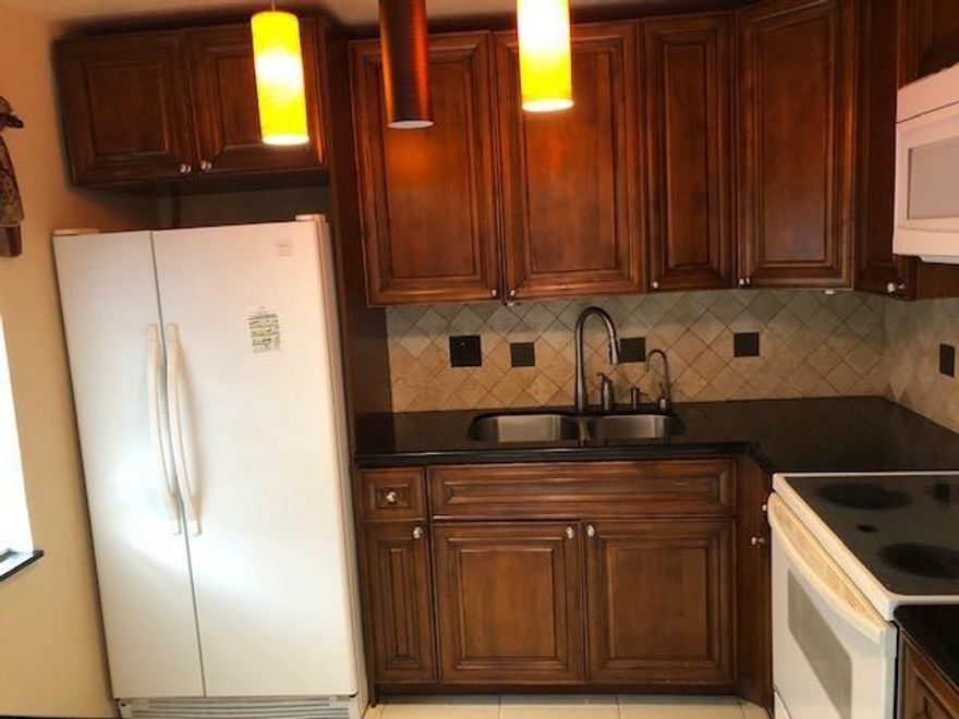 FIRST FLOOR!  2 BEDROOM 2 BATH WITH NEWER KITCHEN CABINETS, GRANITE COUNTER TOPS, WALK IN CLOSET IN MASTER BEDROOM. CLOSE TO SHOPPING, TRANSPORTATION, RESTAURANTS, BANKS AND PHARMACIES. ASSOC. STATES 55+ COMMUNITY, MUST HAVE 675 CREDIT SCORE, 1 CAR PER HOUSEHOLD, SECURITY DEPOSIT REQUIRED BY ASSOCIATION.