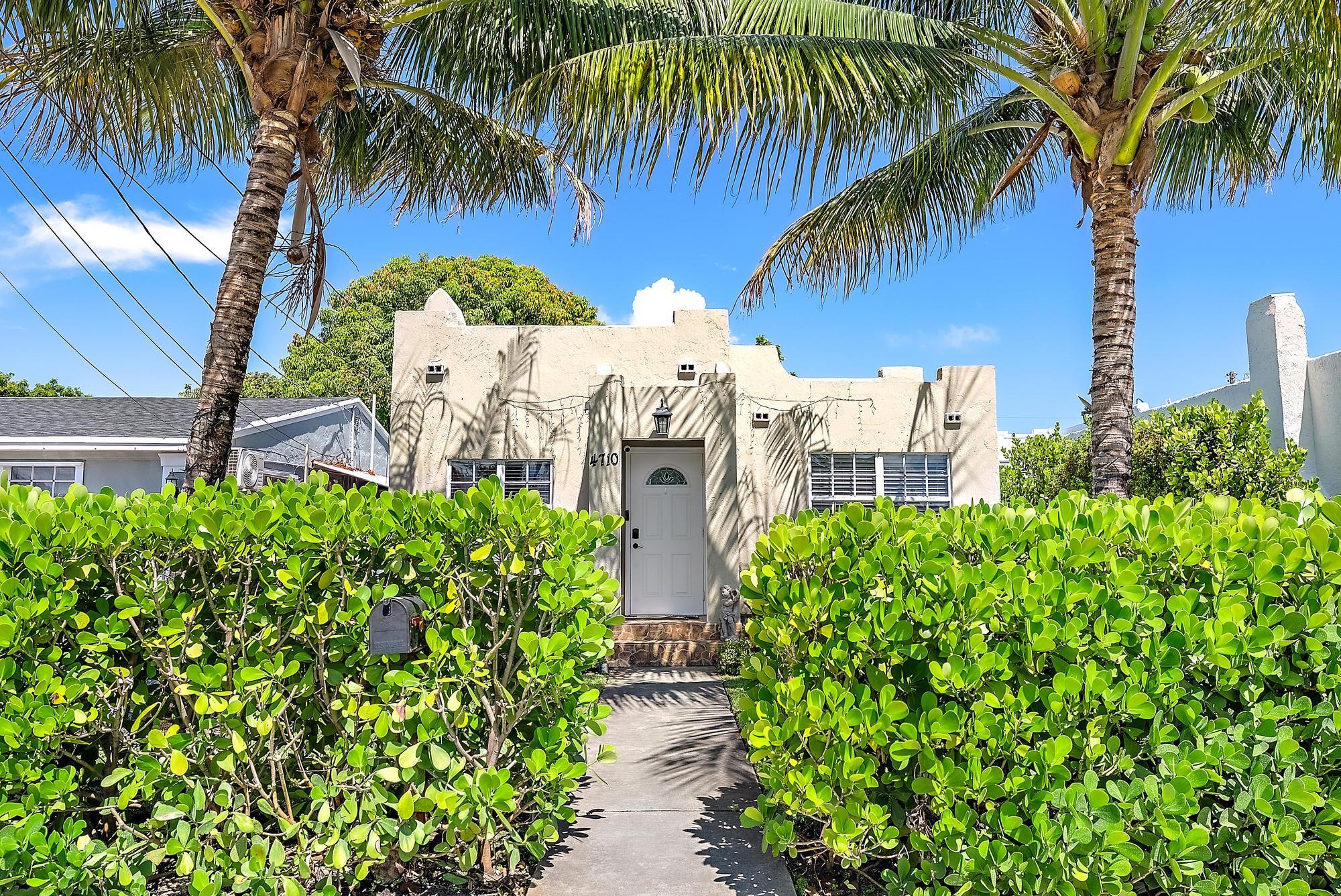 Charming mission style home in the heart of WPB! This well-cared for cottage offers 2 bedrooms with ample closets, a shared bathroom, a large light filled living room, tiled floors, an eat-in kitchen and driveway. The fenced yard features a covered area and green space.