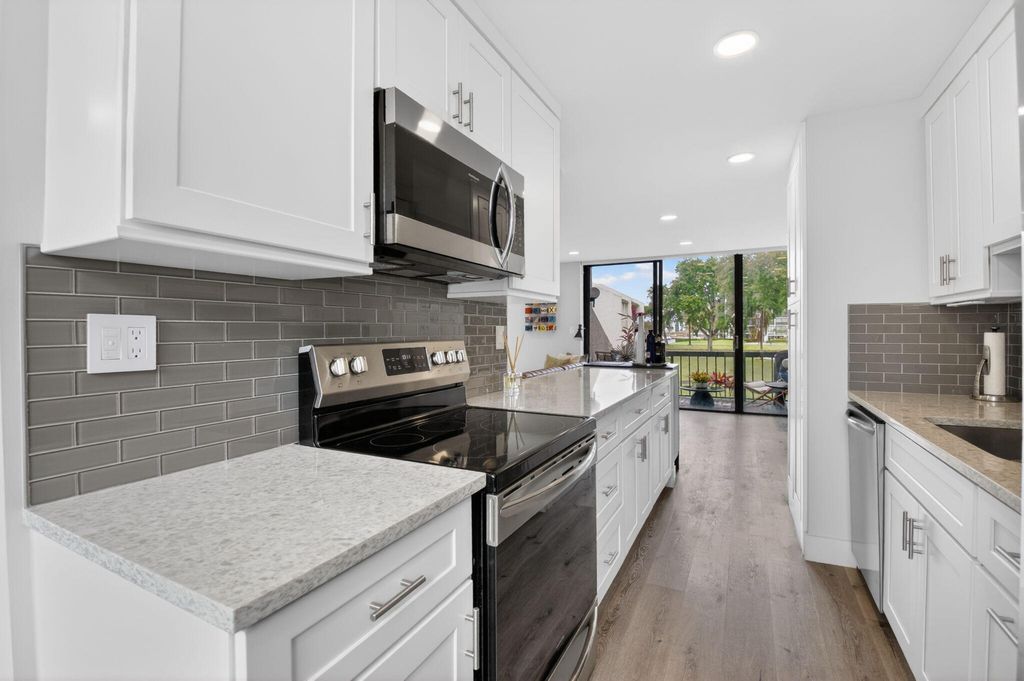 Photo of 1005 Bridgewood Place, Boca Raton, FL 33434 (MLS # B26013022)