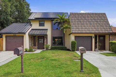 Photo of 1001 Raintree Lane, Palm Beach Gardens, FL 33410 (MLS # B26020172)