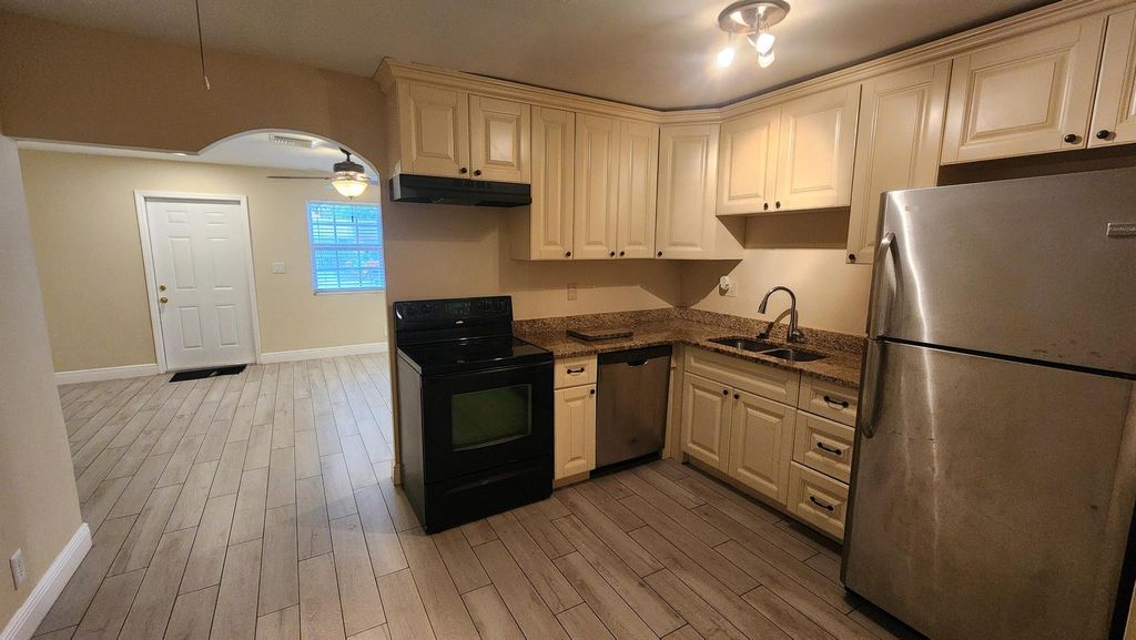 Photo of 4538 Empire Way, Greenacres, FL 33463 (MLS # R11137265)