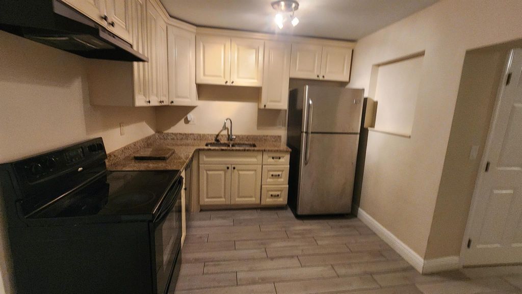 Photo of 4538 Empire Way, Greenacres, FL 33463 (MLS # R11137265)