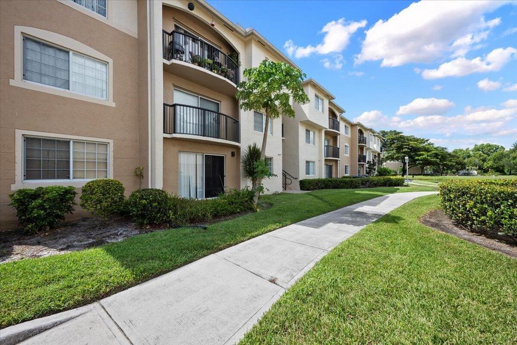 Photo of 800 Crestwood Court S #820, Royal Palm Beach, FL 33411 (MLS # R11120193)