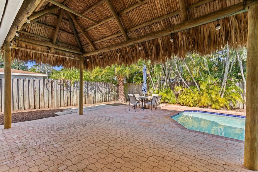 This home will rent quickly! This 3 bedroom, 2 bath pool home with a large tiki extending the tropical living space over the brick paver patio. Light and bright interior with a large living room and step down to family room. Remodeled kitchen with granite counters and breakfast bar.   Single carport and circular driveway. This home is located East of Federal Hwy near the Pompano Park, Stores and Restaurants. Boat parking or RV parking is acceptable to owner.  2 pets maximum (non aggressive breeds) with pet security deposit. Lawn Care and Pool service included in rent!Don't let this home pass you buy.