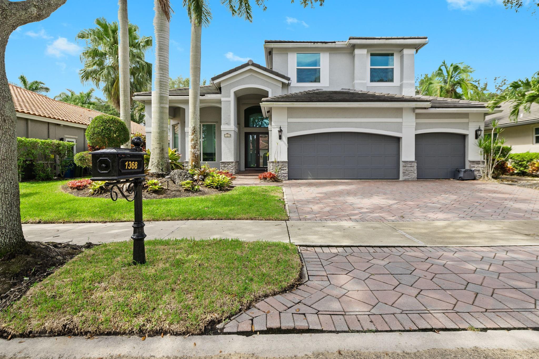 5/4 with 3 car garage with pool, spa and fenced in lot in Guard gated community of the Islands. . Downstairs has full bedroom with Murphy bed and renovated Cabana Bath. Modern Kitchen w/ breakfast area, Living, Dining, Family Rooms, Electric Fireplace, Large Laundry Room. The second floor has four beds & three full baths. Master Bedroom is huge and has Modern renovated bathroom. One secondary bedroom upstairs has dedicated full bath. New Roof 2019. Impact glass and doors. AC units 2015,2017, Water heater 2016. Garage has Tesla charger. Landlord maintaines pool and lawn.