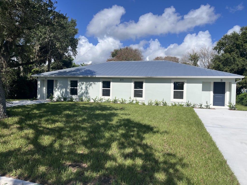 Photo of 311 N 16th Street, Fort Pierce, FL 34950 (MLS # B26056280)