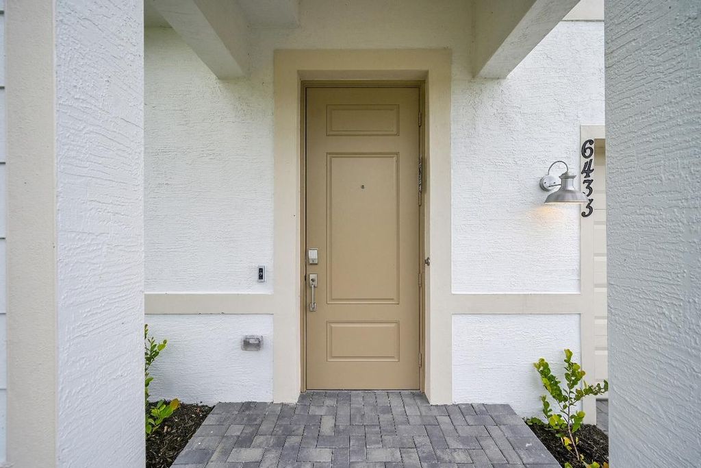 Photo of 3028 Spanish Cedar Place, Fort Pierce, FL 34946 (MLS # R11105228)