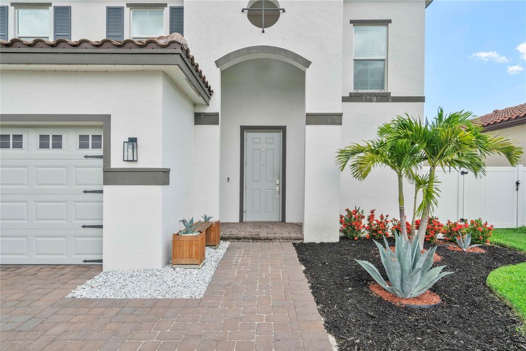 Photo of 12413 NW Lynch Lane, Port Saint Lucie, FL 34987 (MLS # F10514655)